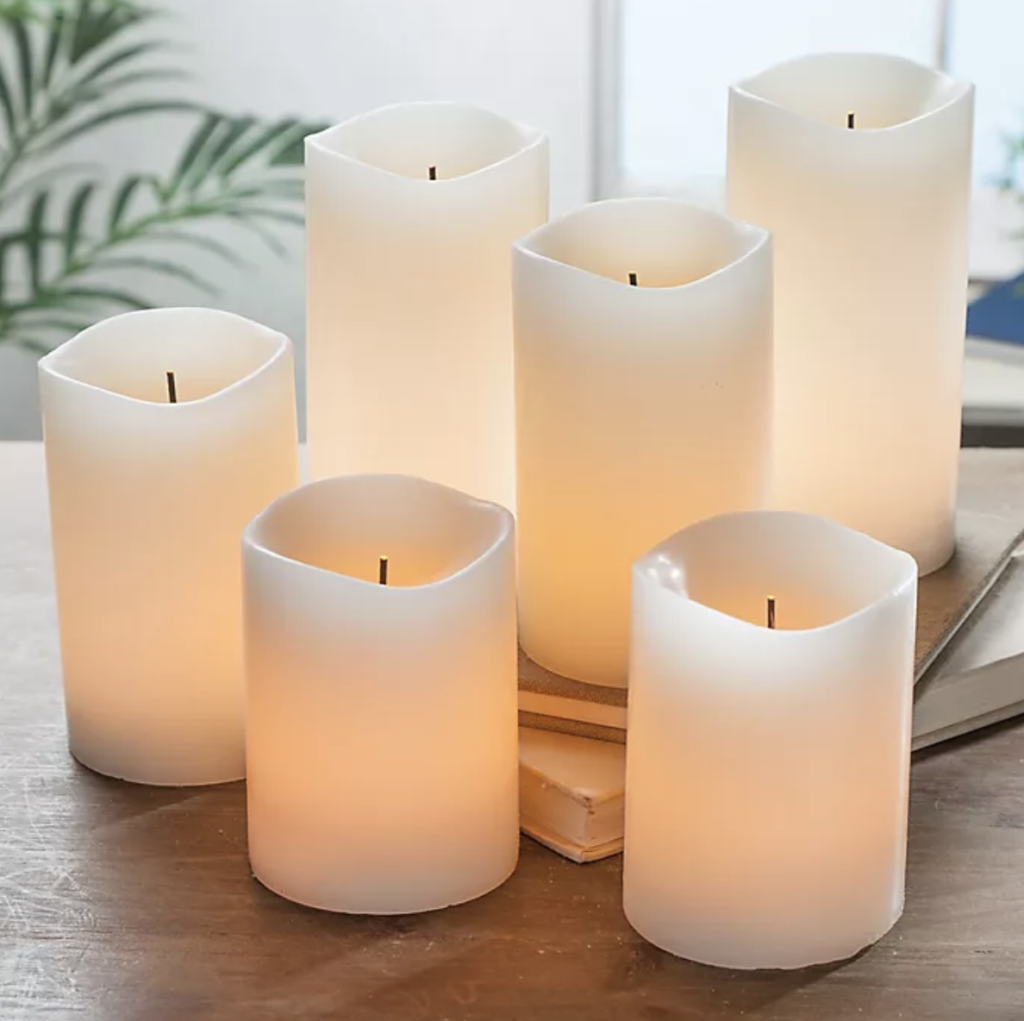 flameless candles make a pretty arrangment in a first apartment